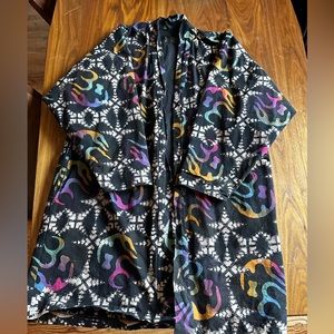 Black coat with unique pattern